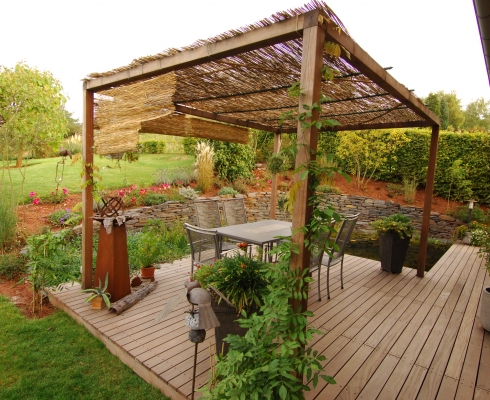 Crämer & Wollweber Garten- und Landschaftsbau GmbH Gestaltung Gartenteichanlage mit Holzterrasse