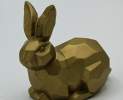 1st Tannendiele - Kleiner goldener Osterhase, liegend Thumbnail