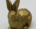 1st Tannendiele - Kleiner goldener Osterhase, liegend Thumbnail