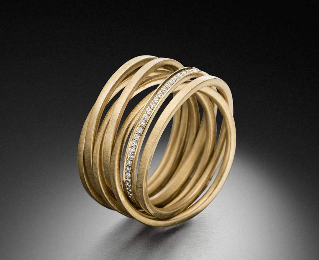 STEINBACH Goldschmiede Kettenring Gelbgold mit 7 Einzelringen STEINBACH Goldschmiede Kettenring Gelbgold mit 7 Einzelringen