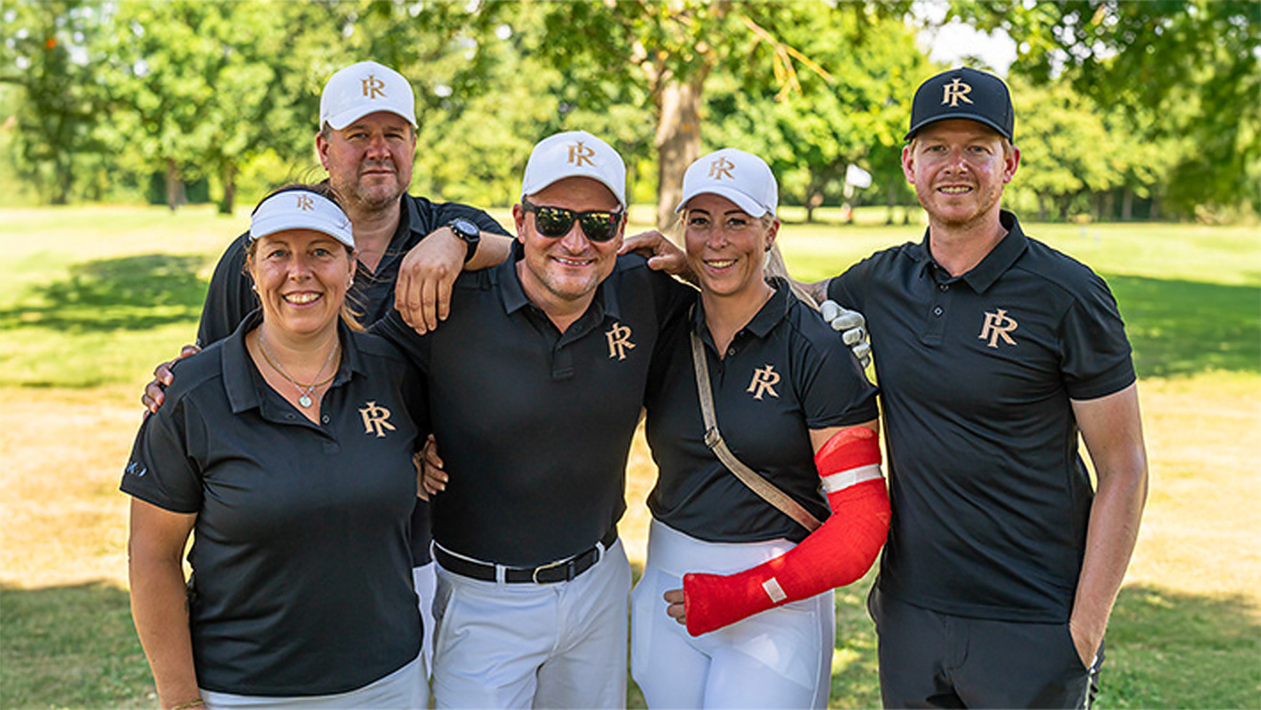 Thomas Rückner mit Kollegen auf dem Golfplatz
